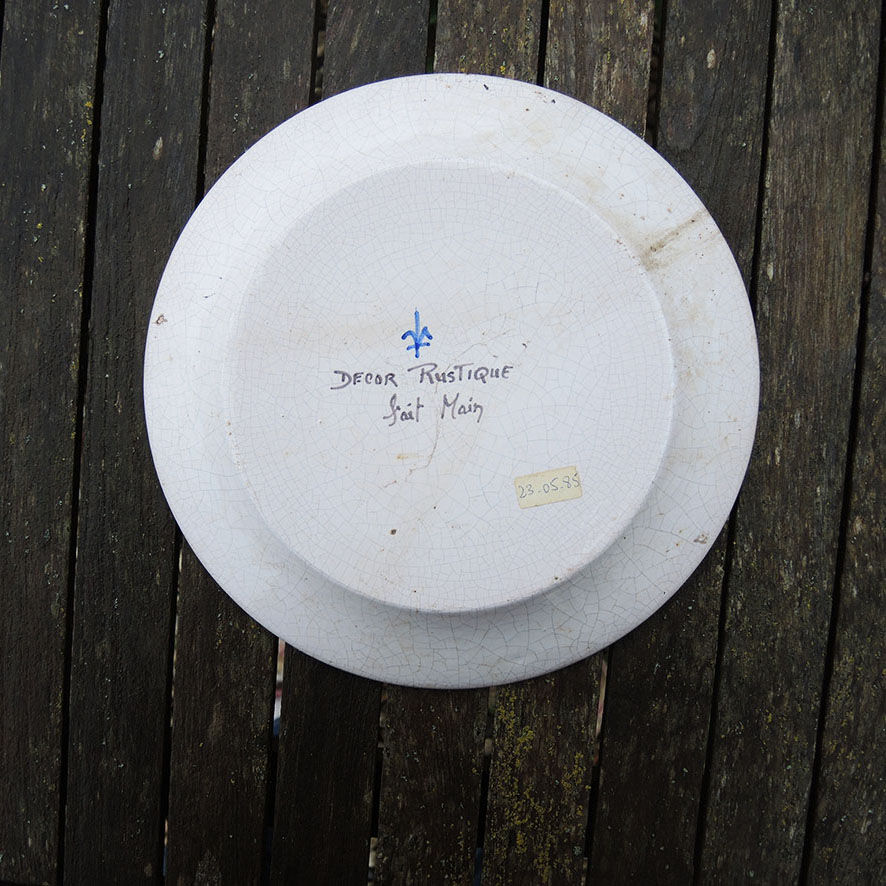 Old deep plate with rooster in Nevers ceramic