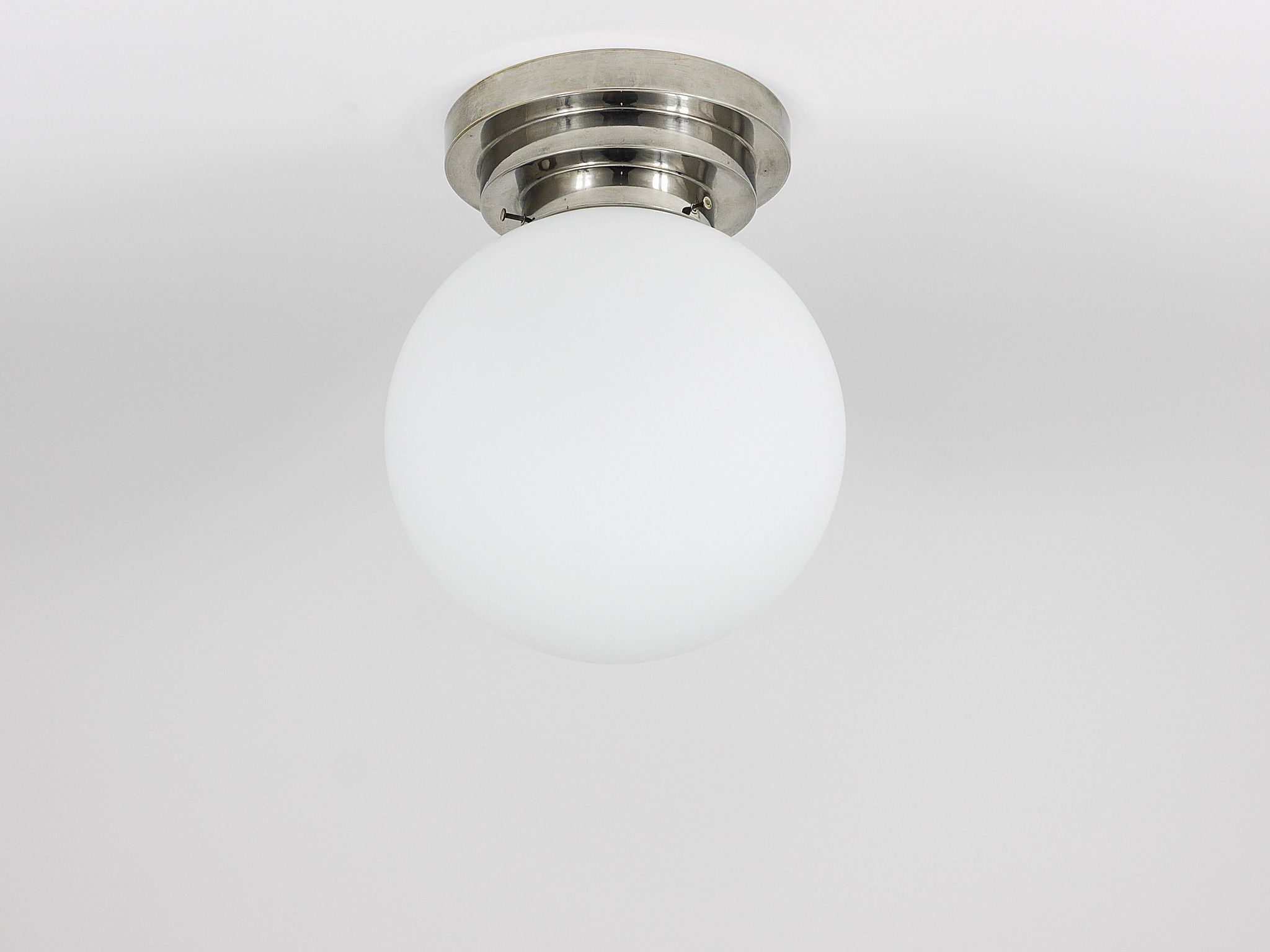 Large opaline glass globe ceiling lamp in Art Deco style.