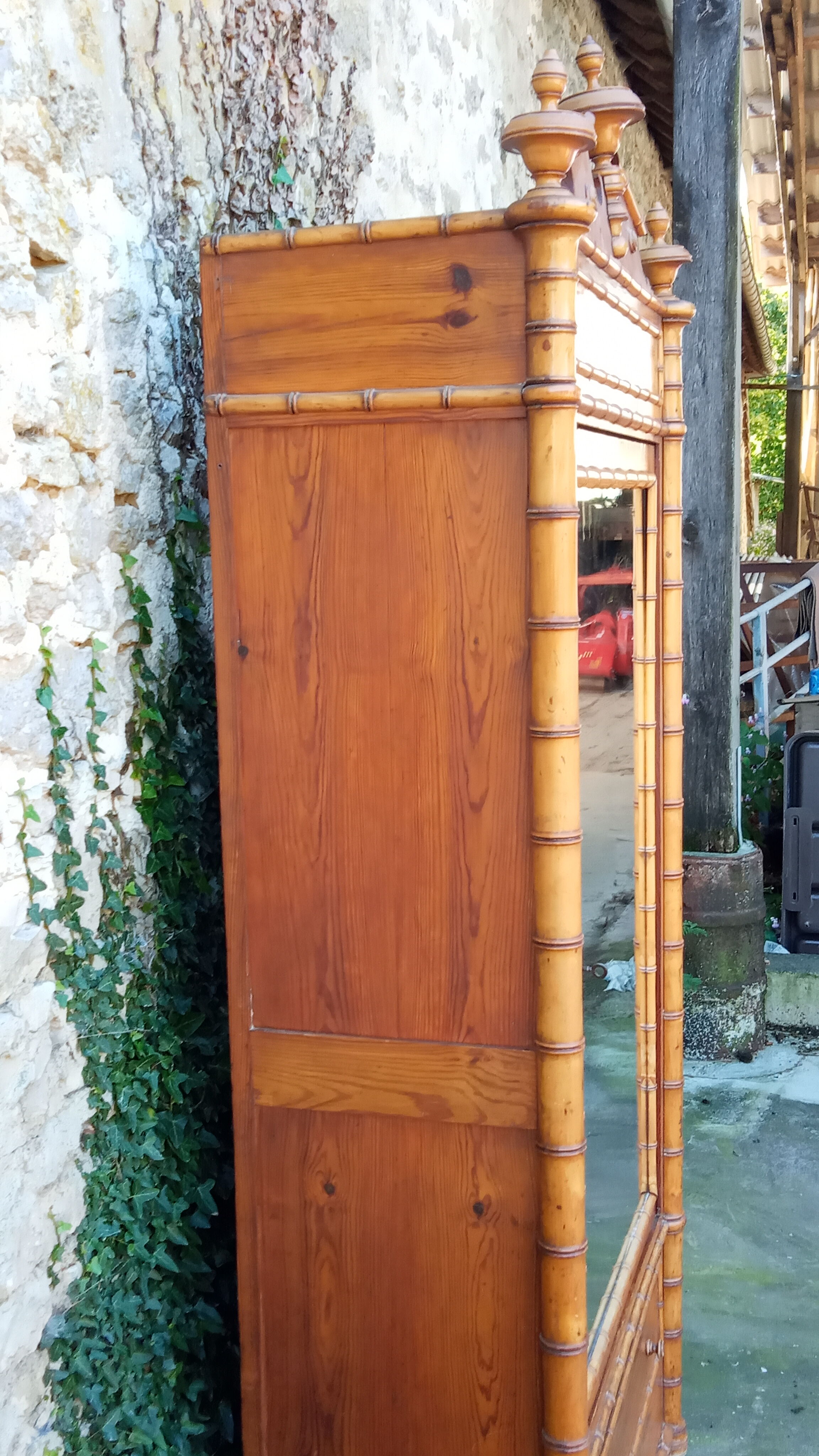 Early 20th century wardrobe in turned pine and pitch pine