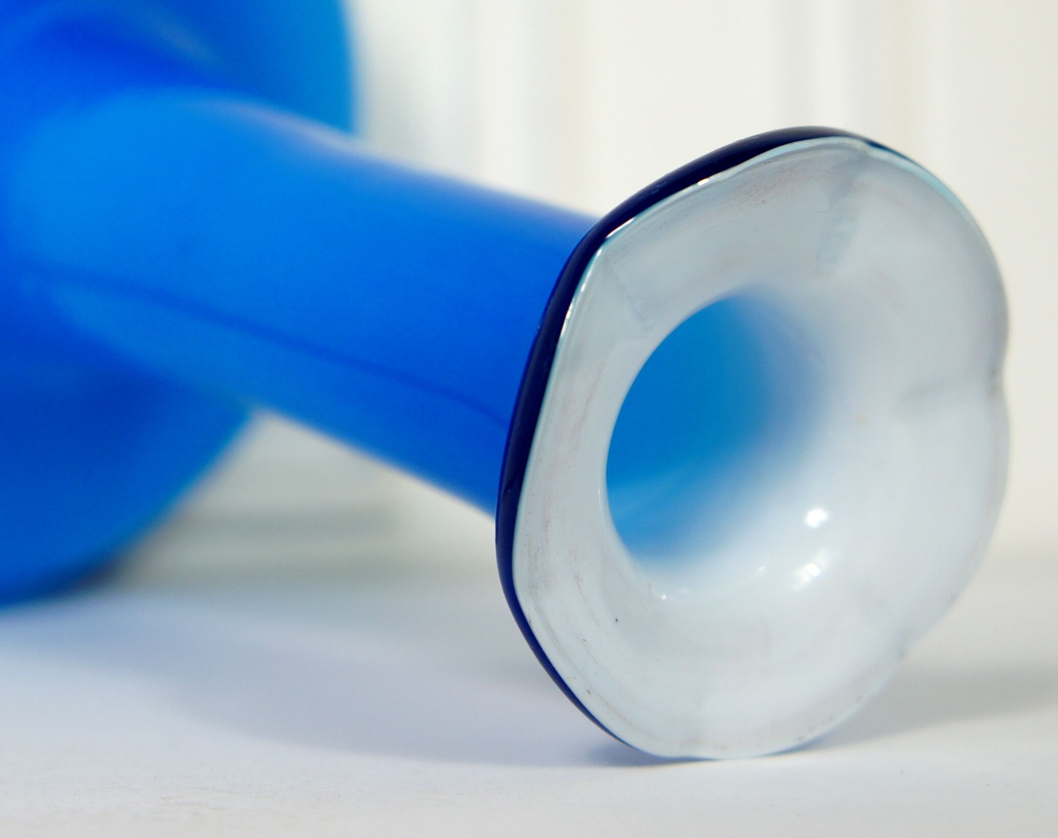 Flattened blown glass corolla vase