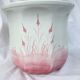Earthenware pot cover with reed patterns