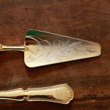 Golden cake cutlery service