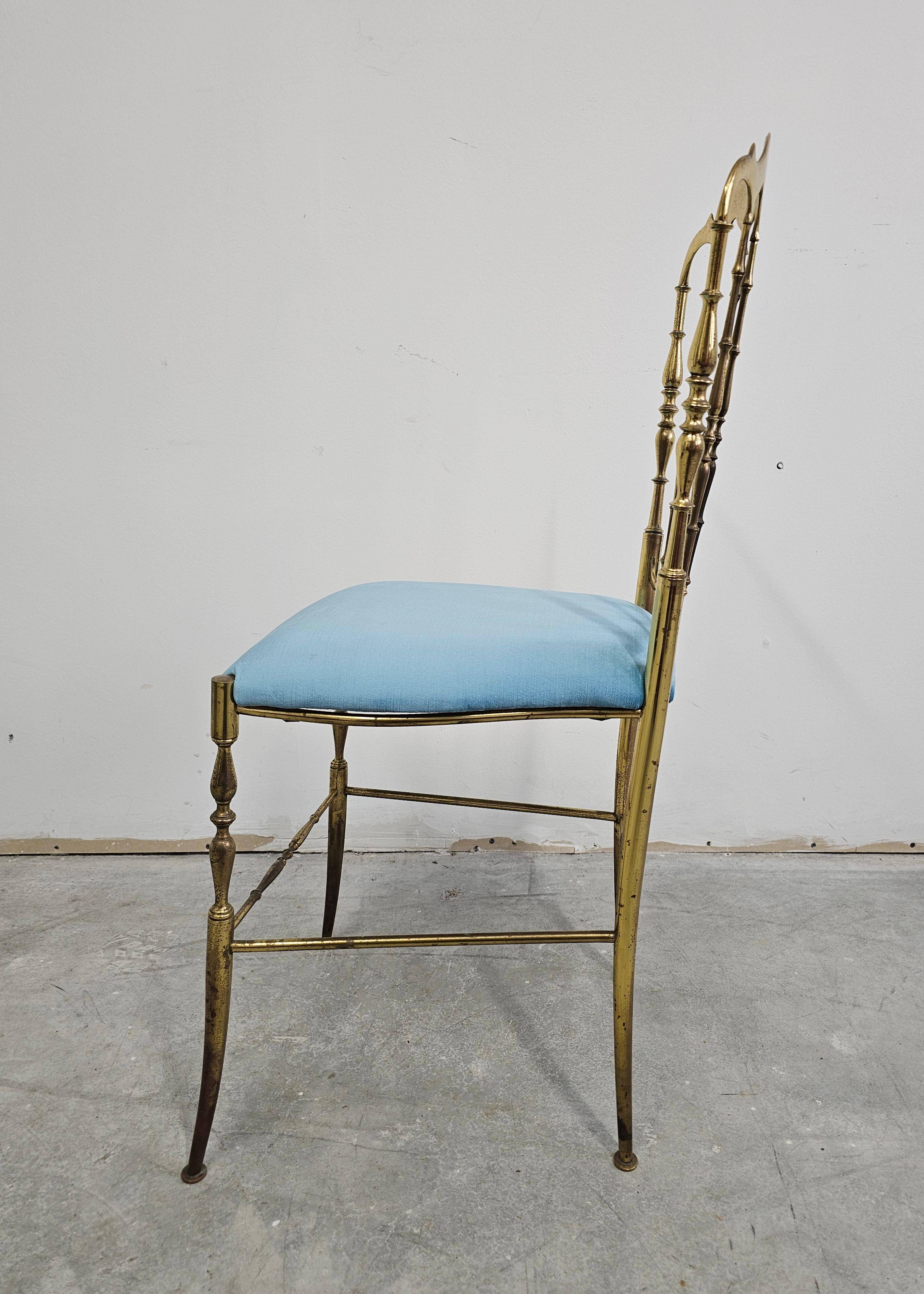 Mid-century Chiavari accent chair in solid brass with a plush seat.