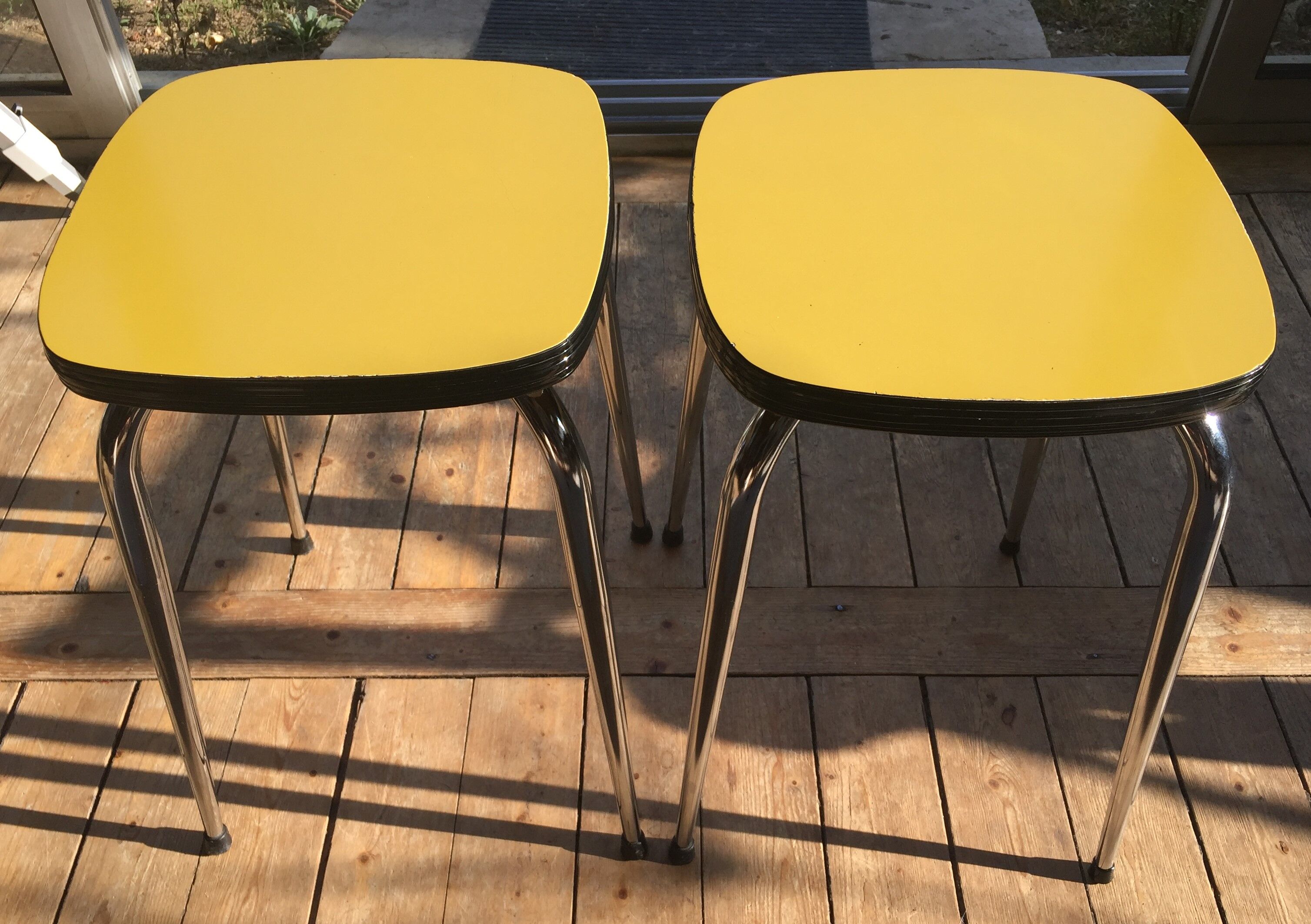 Duo of vintage formica mustard yellow stools