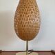 Design lamp in gold metal and wicker