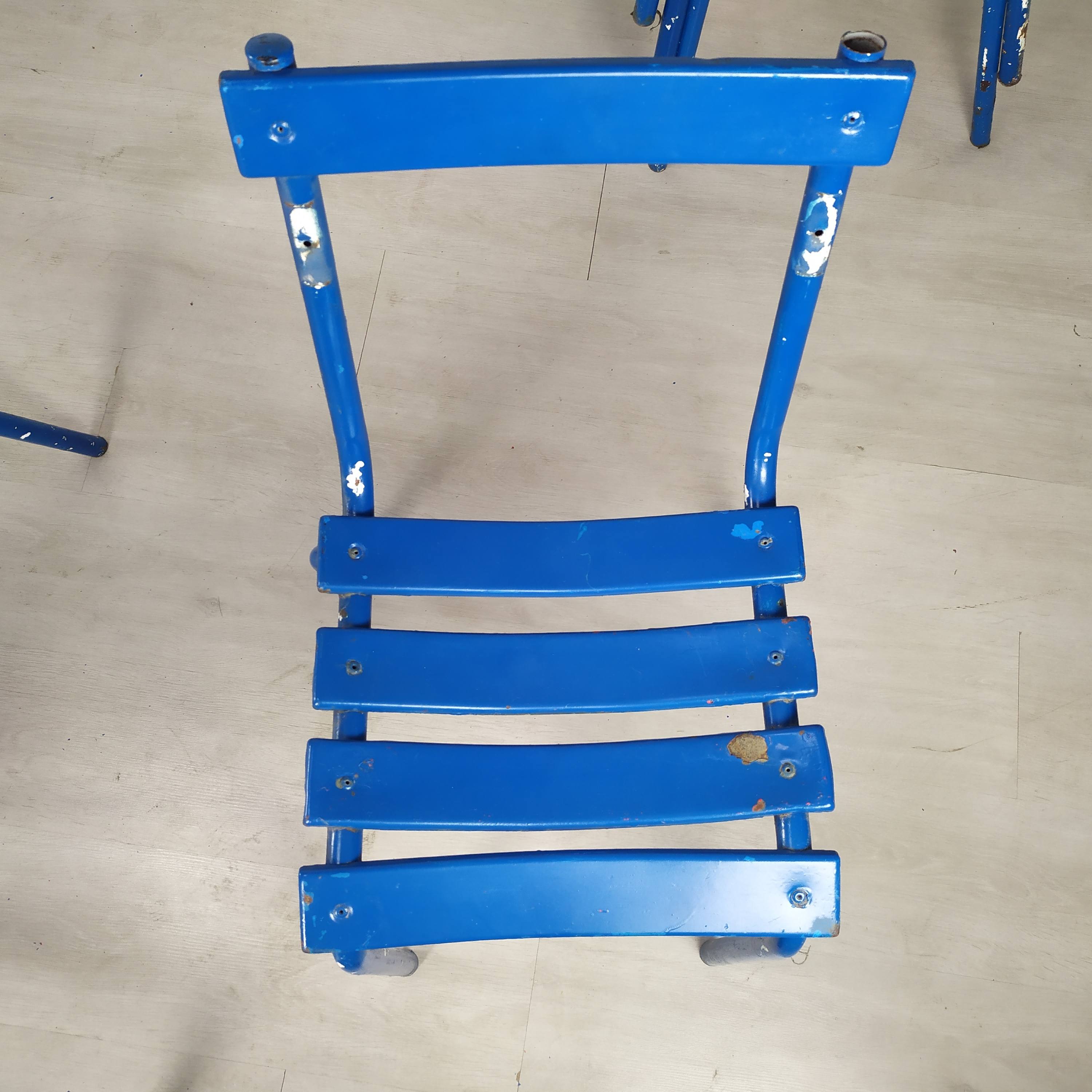 14 blue metal bistro chairs