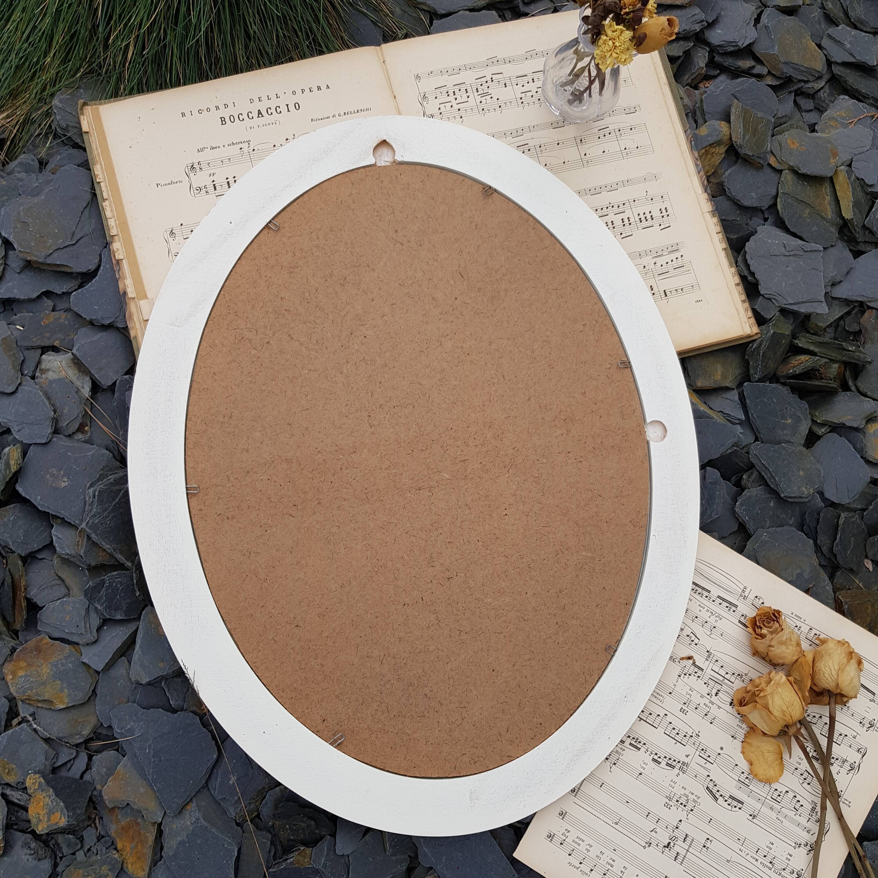 Oval wooden mirror