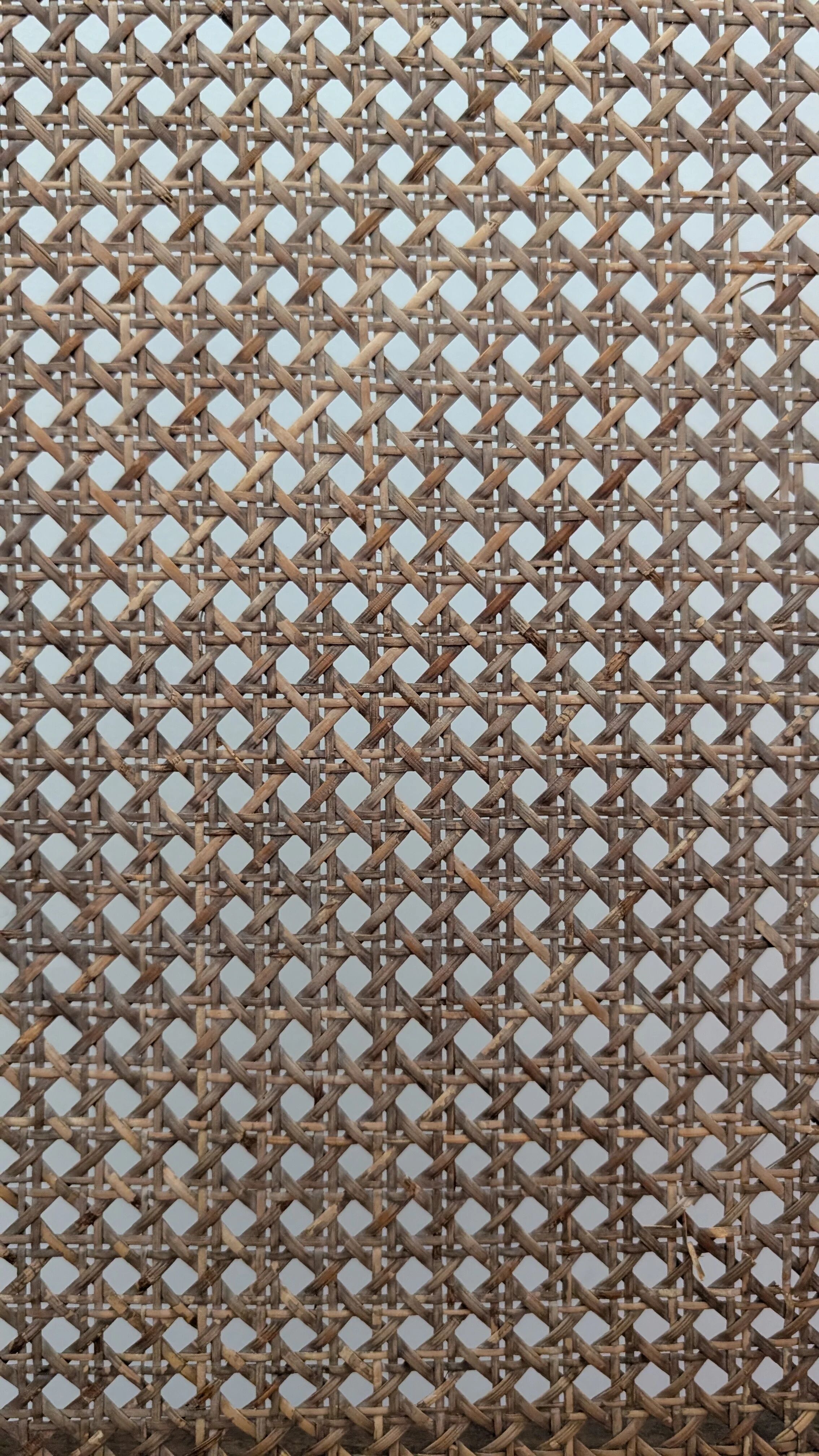 Antique Louis XVI style armchair in wood and caning