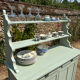 Buffet parisien vintage et son verrier vert d’eau