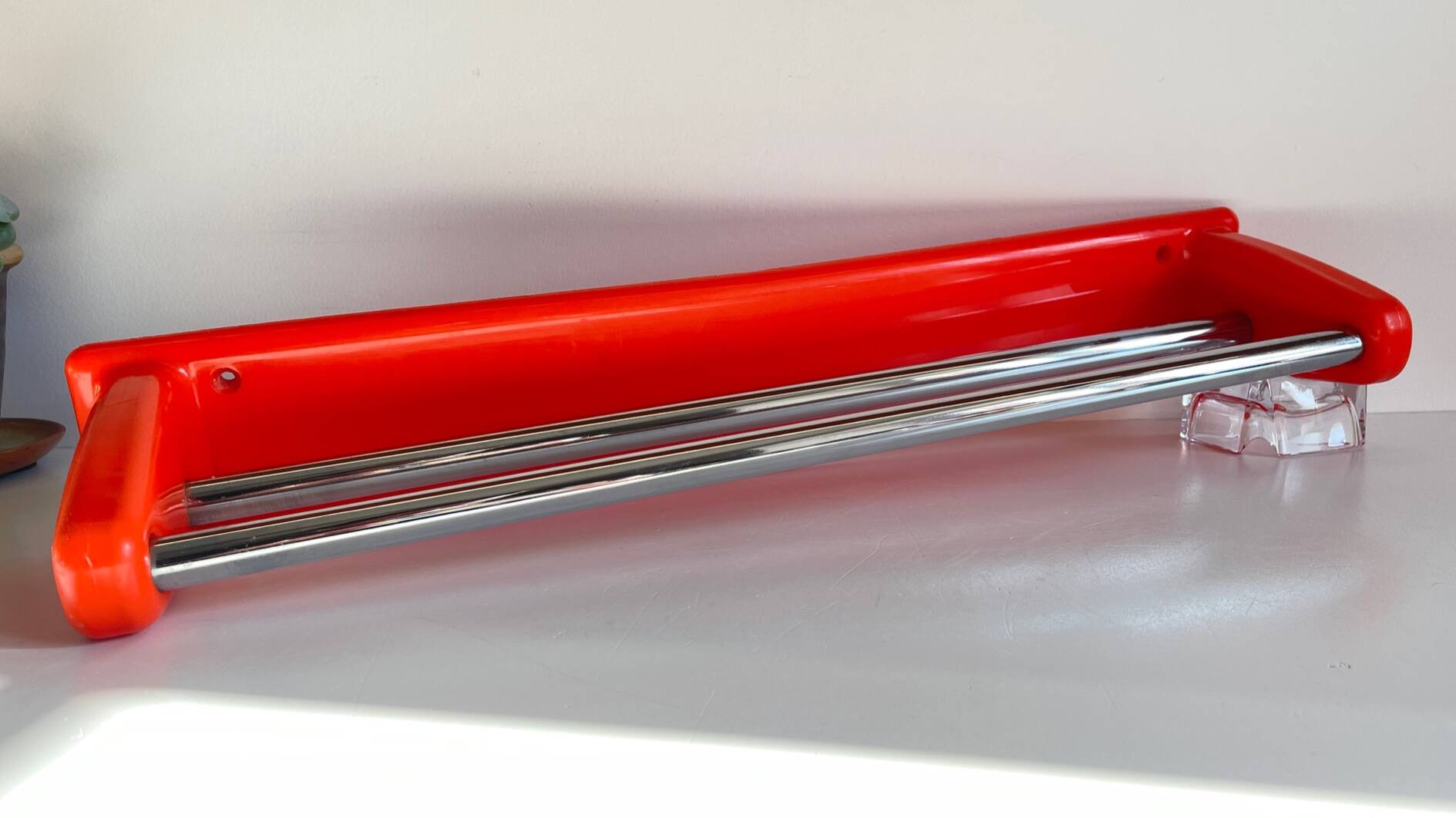 Orange towel rack by Syla from the 70s