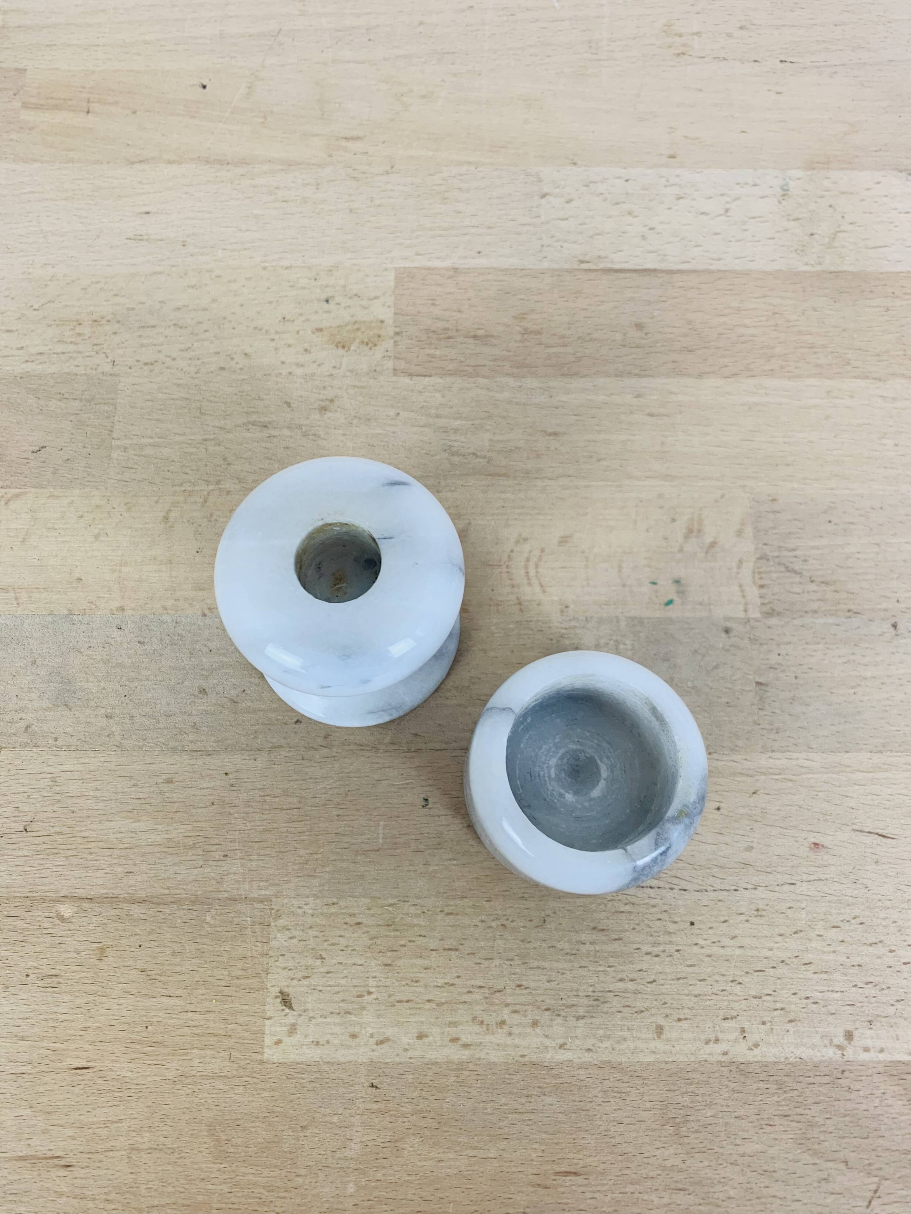 Pair of vintage white marble candlesticks