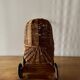 Old wicker dolls' pram - wooden wheels