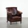 Fauteuil en cuir de vache au caractère distinctif et confortable