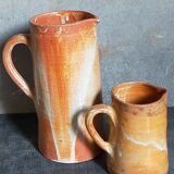 Duo of vintage glazed stoneware potter's pitchers