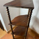 Corner shelf on a turned wooden stand