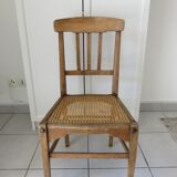 Antique solid wood chair with caning, country house style.