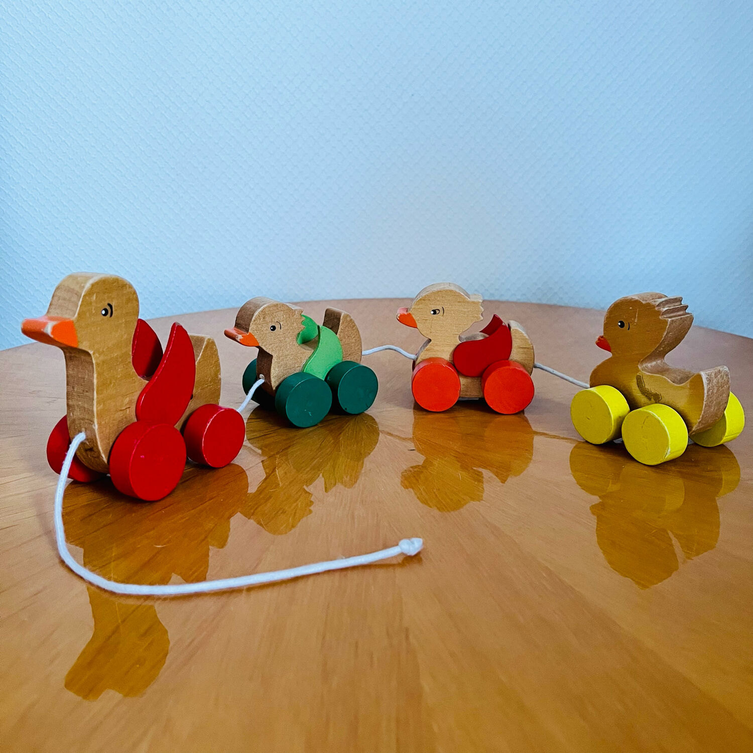 Old vintage wooden duck toy to pull