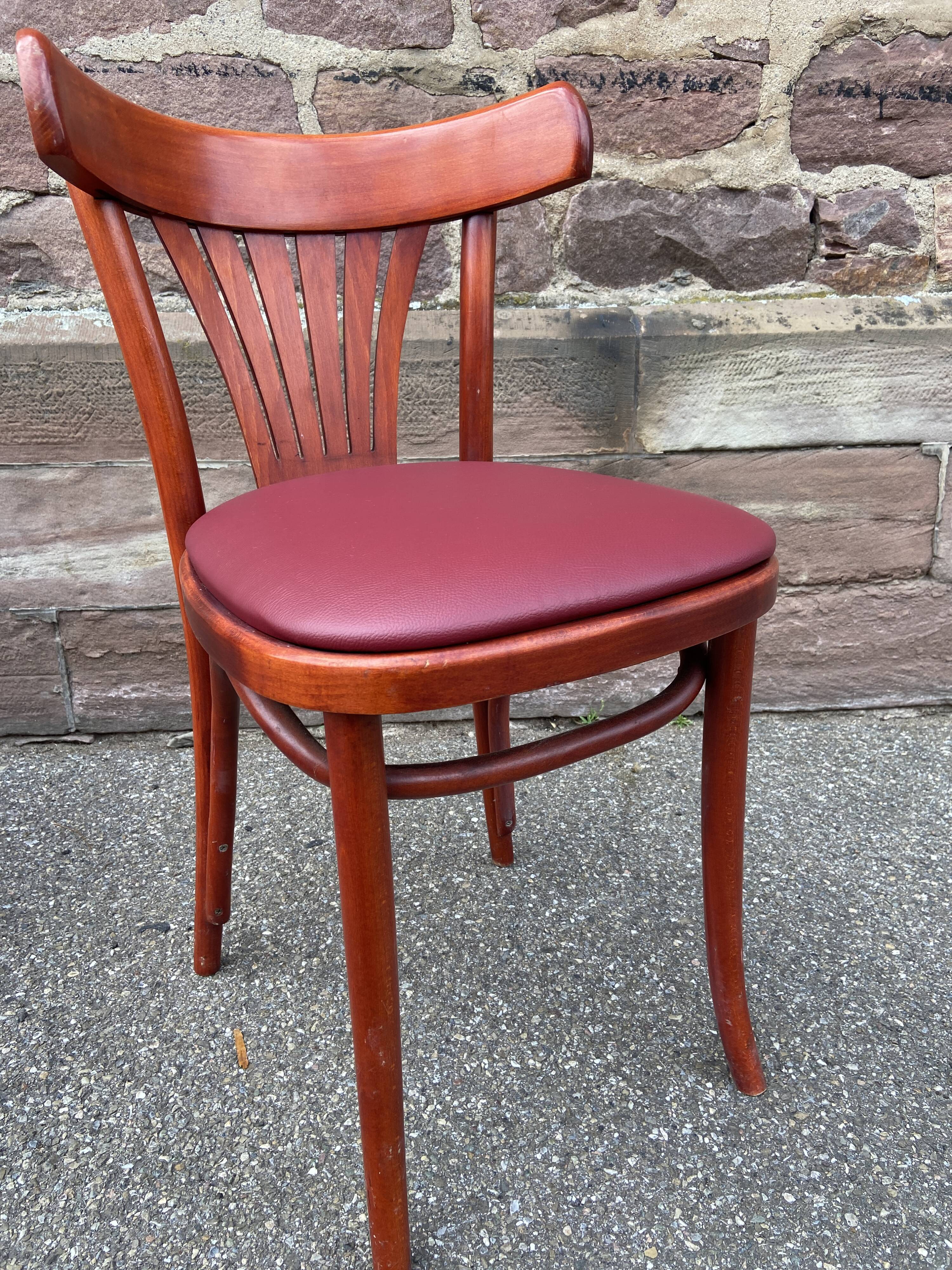 Pair of Alsatian bistro chairs in wood and leather, 1960