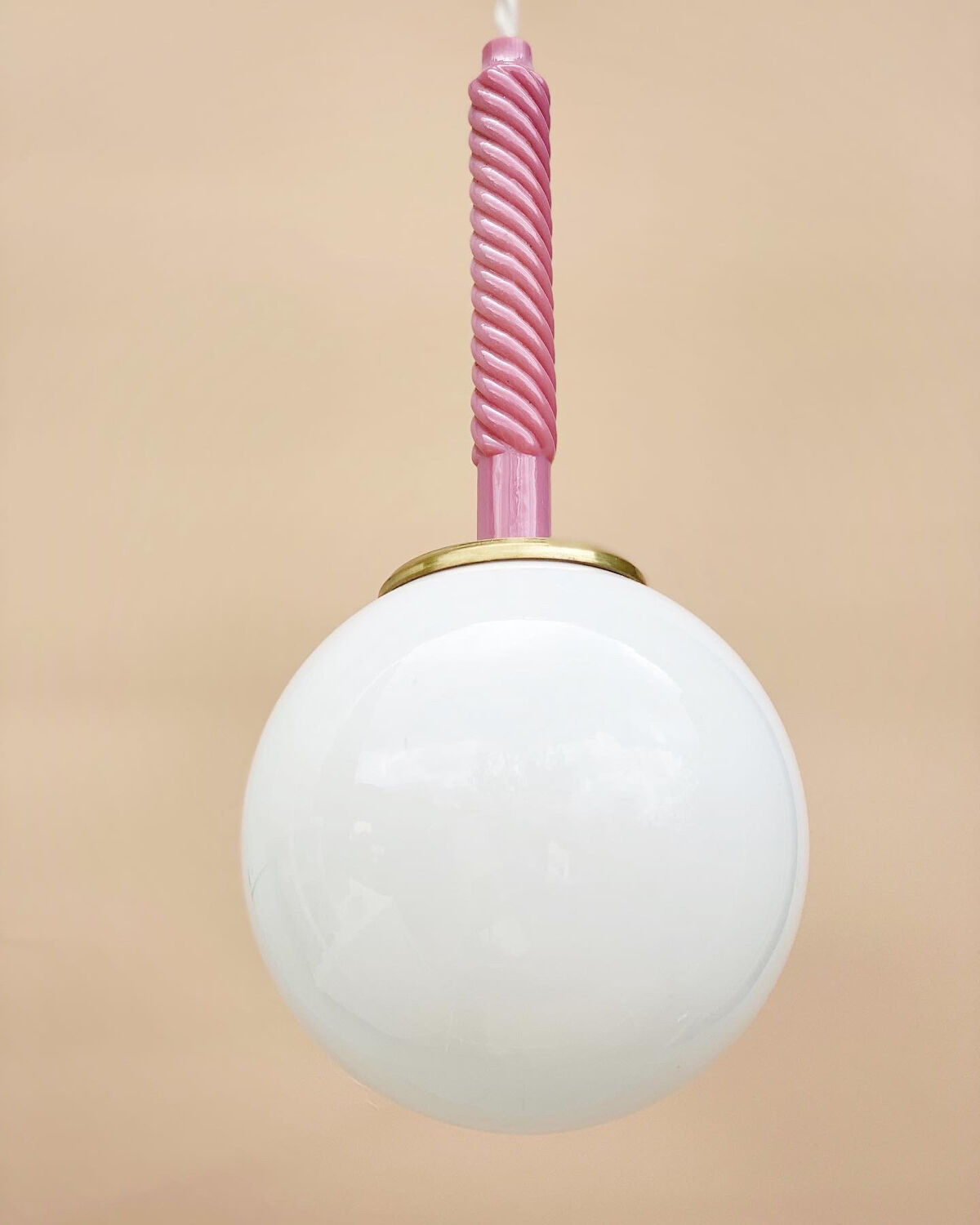 Suspension globe and candle of antique chandelier in opaline