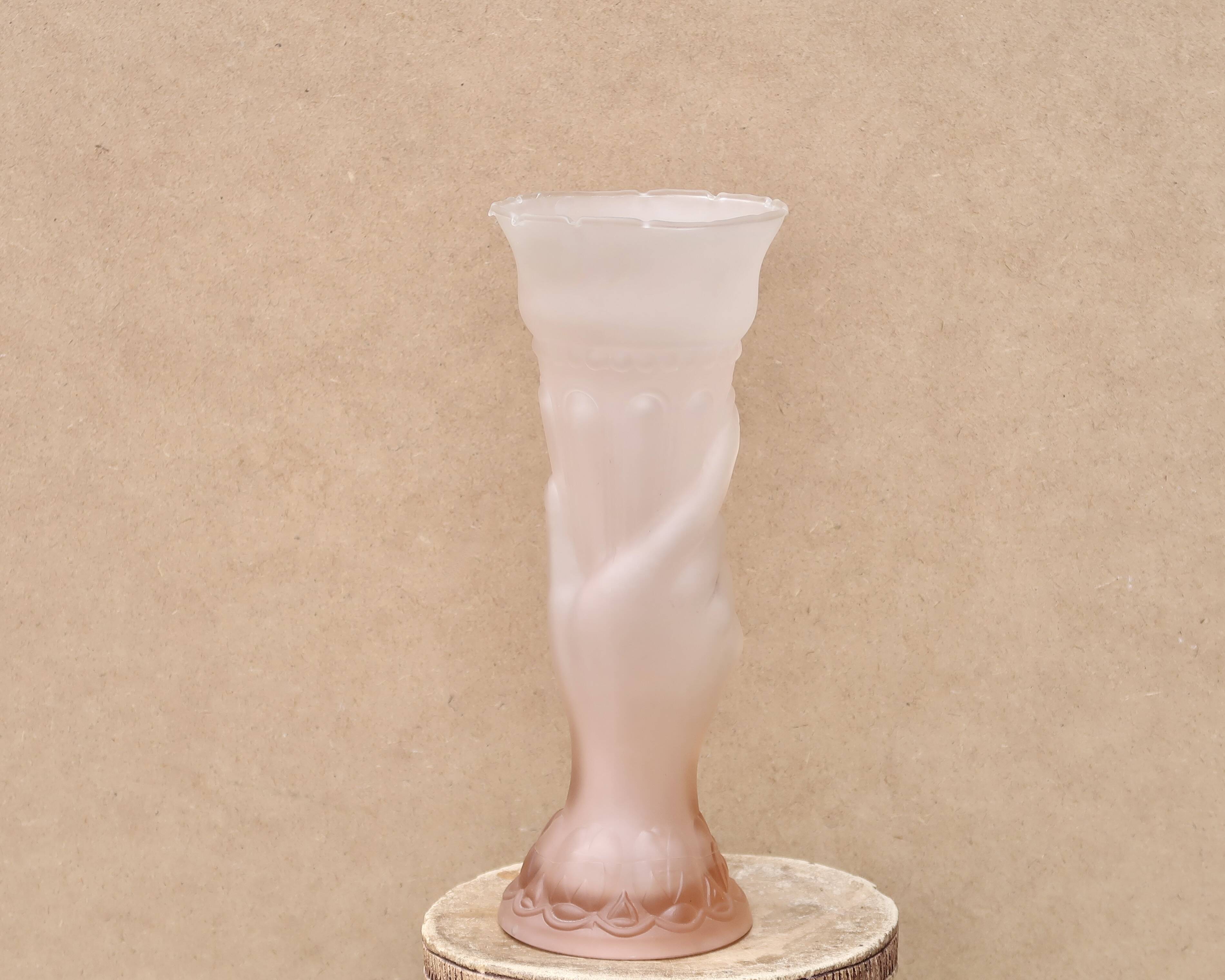 Pale pink glass vase decorated with a hand, 1960s