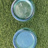 Pair of ashtrays or empty round glass pockets