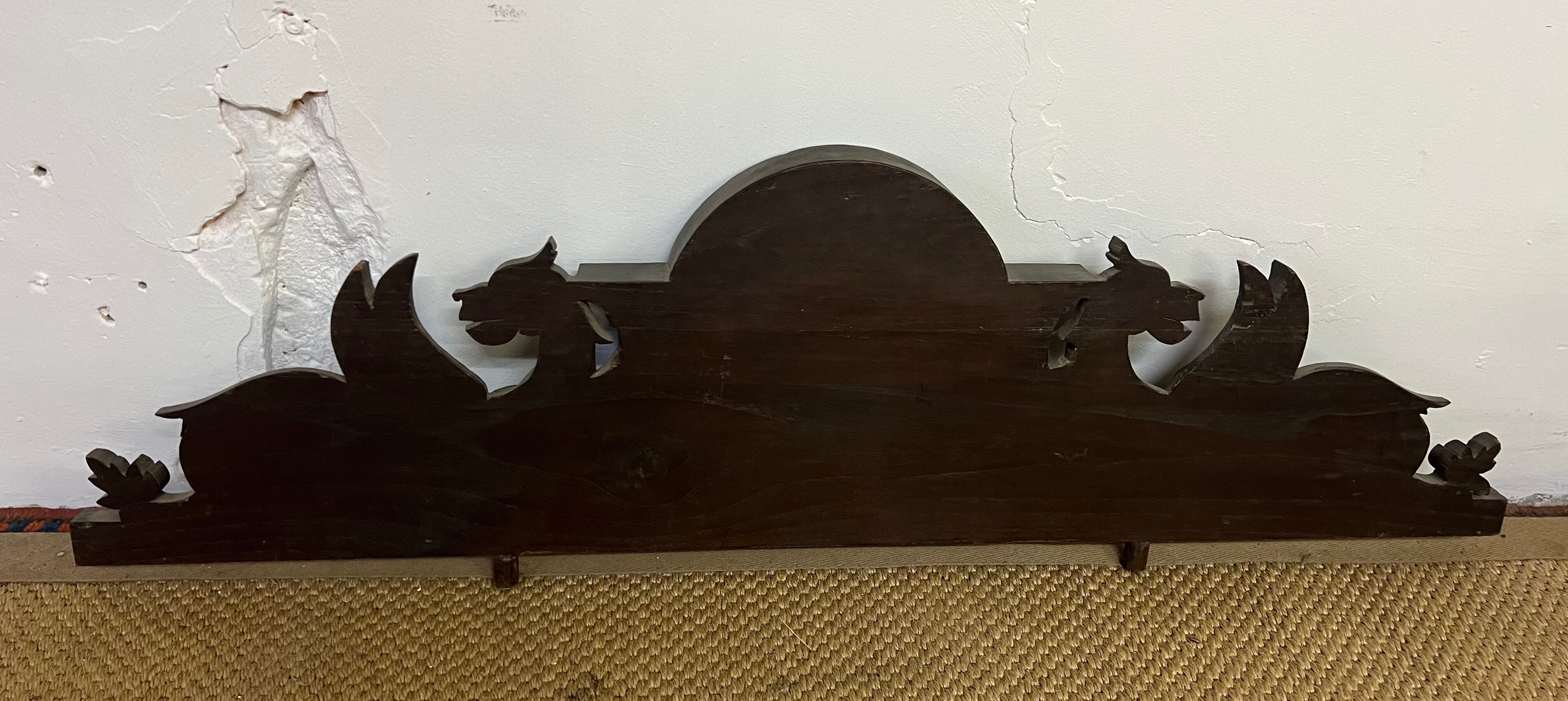 Wooden cabinet pediment