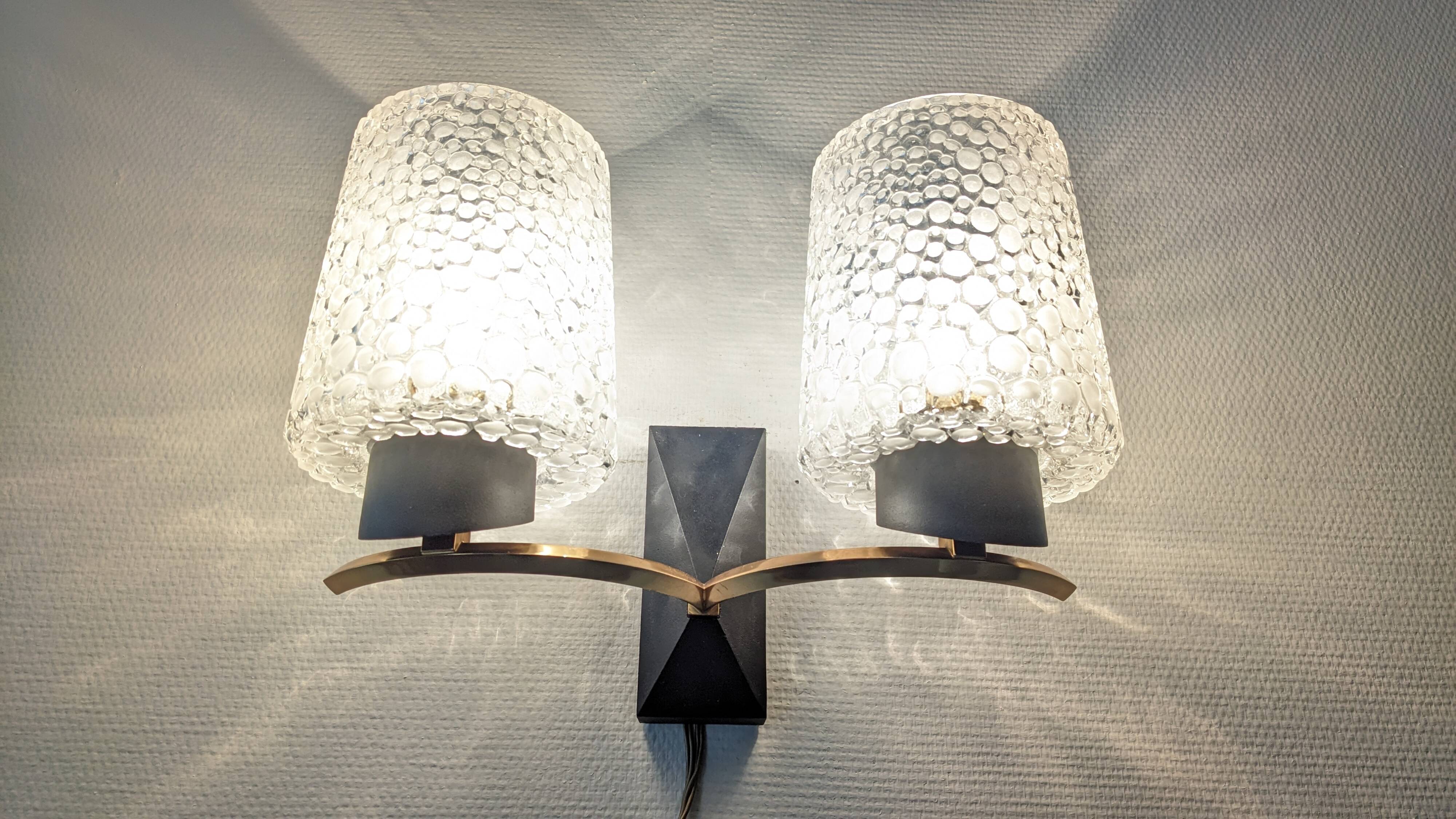 Pair of double wall lights in bubbled glass by Maison Arlus, France circa 1960.