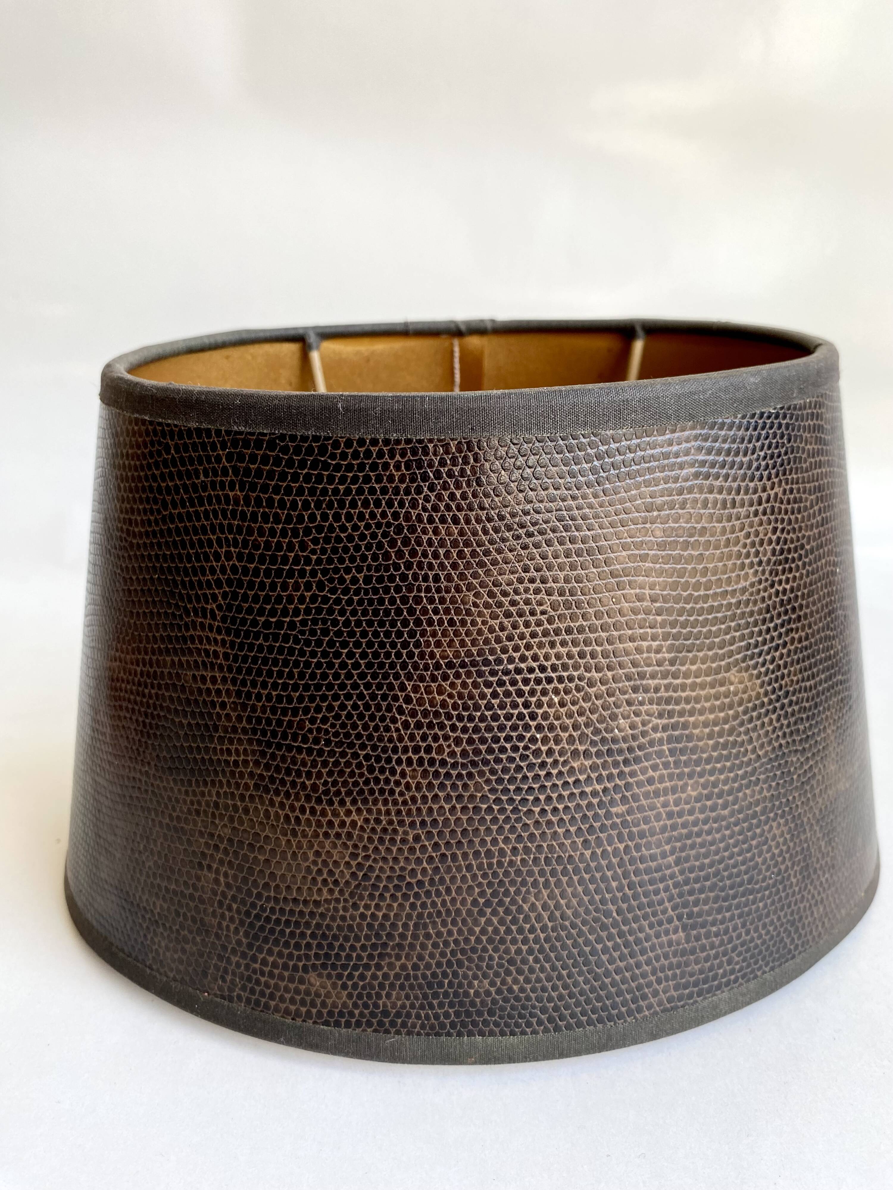 Copper lamp, fabric cable, sewn lampshade and leather.