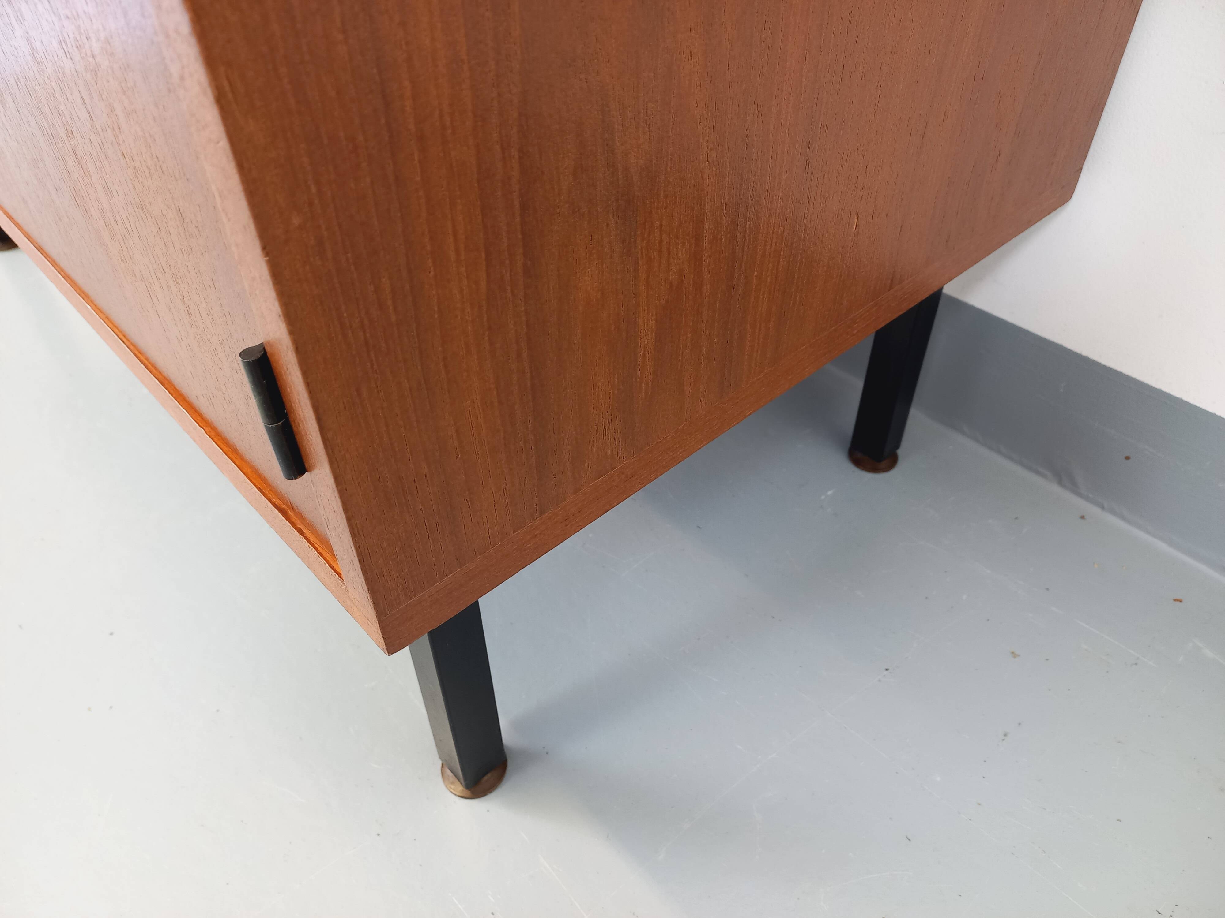 Small vintage storage unit in modernist Scandinavian style in teak from the 60s