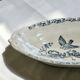 Iron flat plate with a 19th-century bird signed Onnaing "Poppies"