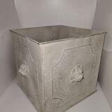 Square planter with a patinated iron lion's head