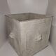 Square planter with a patinated iron lion's head