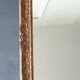 Large Montparnasse rocaille style frame in carved wood mounted in mirror.