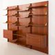 Italian mid-century teak wall unit on panels, 1970s
