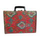 Old suitcase, red cashmere fabric, bohemian folk