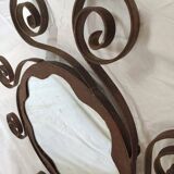 Pair of wrought iron sun mirrors