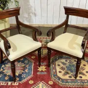 Set of 2 armchairs and 6 English mahogany chairs from the 1950s.