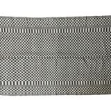 Romanian floral rug handwoven in wool, white and black background