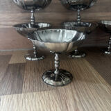 Vintage set of 6 finely engraved stainless steel bowls.