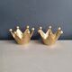 Pair of crown candle holders in brass