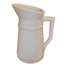 Cream glazed ceramic pitcher