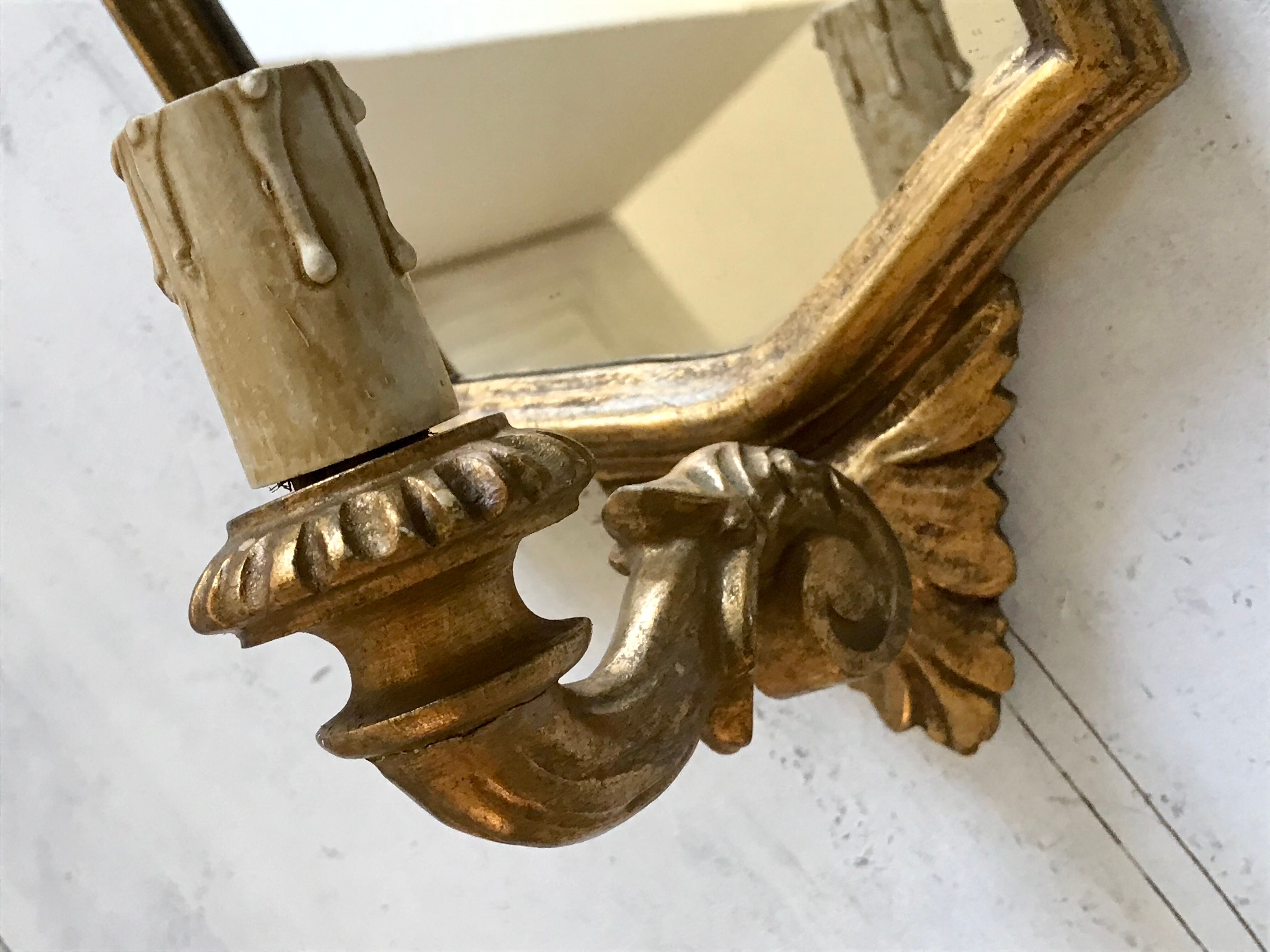 Pair of florentine wall lamps