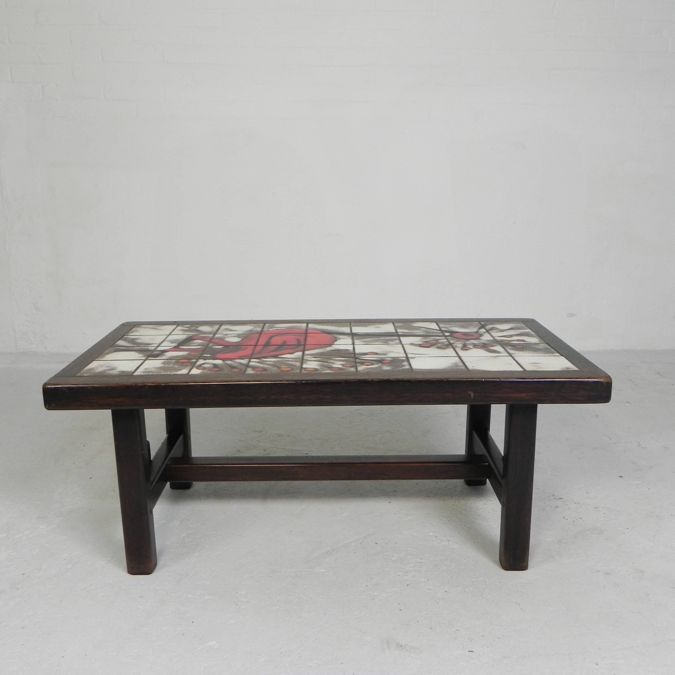 Square tile table from Vallauris, signed Dan with an image of a fantastic bird, 1960s.