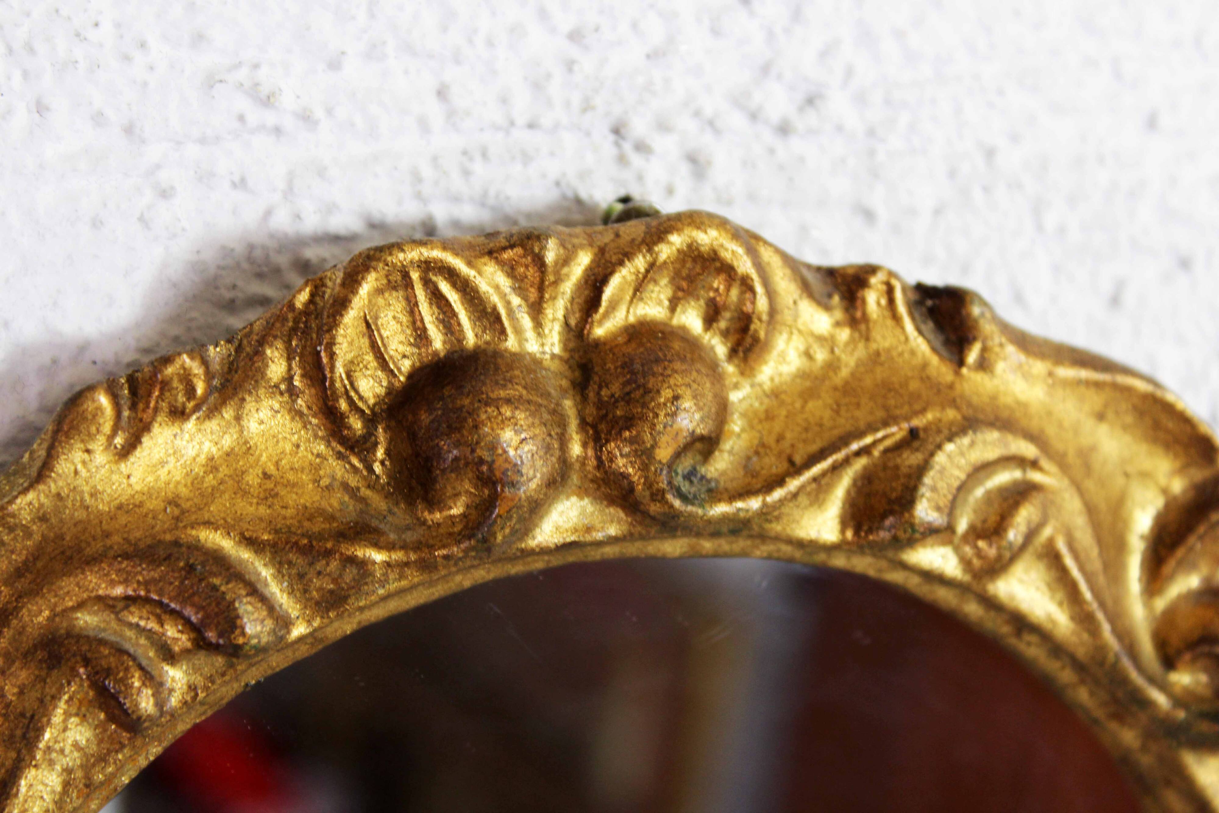 Round gold leaf mirror