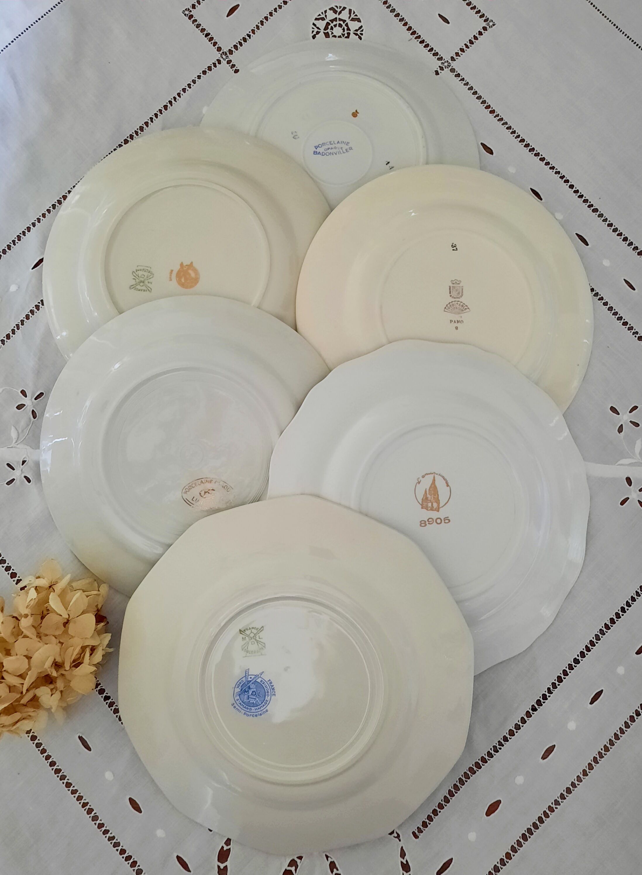 Mismatched old flat plates with gold