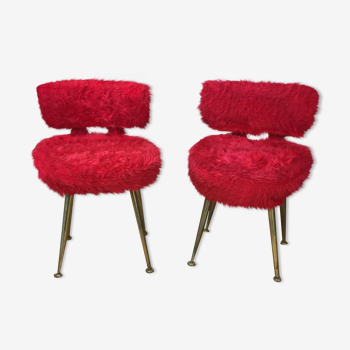 Pair of red Pelfran armchairs