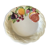 Vintage plate in ceramic enamelled decoration of fruits in relief