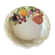 Vintage plate in ceramic enamelled decoration of fruits in relief