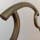 Brass magazine rack in neo-classical style, 20th century.