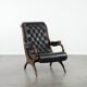 Fauteuil chesterfield en cuir de vachette noir classique et confortable